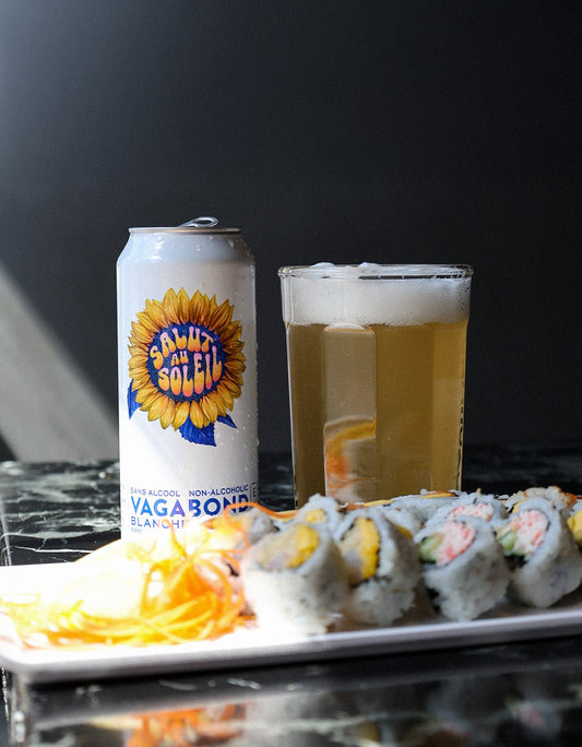 Salut au Soleil Bieres Vagabond biere sans alcool citron gingembre canette et bière accompagné d'un plateau de sushis.